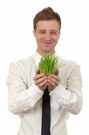 simsearch:400-04385133,k - man holding a small plant in the studio isolated Stock Photo - Budget Royalty-Free & Subscription, Code: 400-04832811