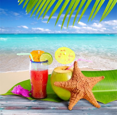 coconuts cocktails straw tropical caribbean beach with starfish Stock Photo - Budget Royalty-Free & Subscription, Code: 400-04833085