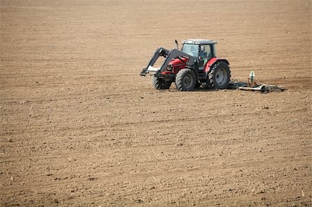 Tractor on field Stock Photo - Budget Royalty-Free & Subscription, Code: 400-04833173