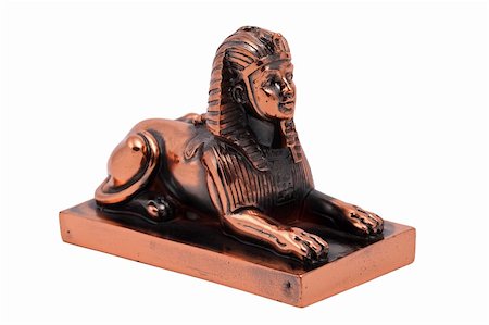 simsearch:879-09191563,k - Bronze statuette of an Egyptian sphinx on a white background Stockbilder - Microstock & Abonnement, Bildnummer: 400-04833393