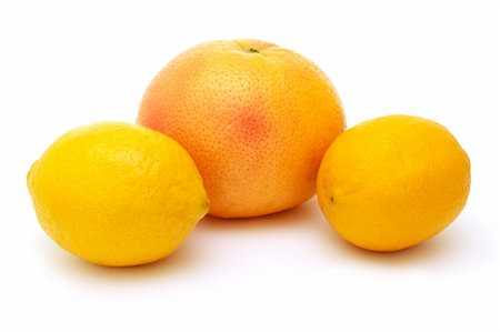 two lemons and grapefruit isolated on white Photographie de stock - Aubaine LD & Abonnement, Code: 400-04833431