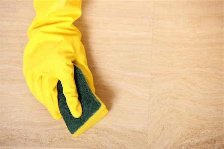 simsearch:400-04324983,k - A picture of a hand in yellow gloves cleaning the floor Stock Photo - Budget Royalty-Free & Subscription, Code: 400-04833750
