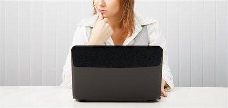 simsearch:400-05732500,k - Business pensive woman with a laptop. Office scene. Foto de stock - Royalty-Free Super Valor e Assinatura, Número: 400-04833862