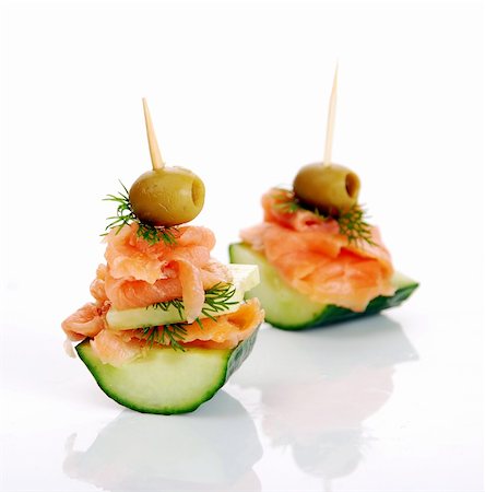 Delicious Appetizer Plate with Salmon and Olives Photographie de stock - Aubaine LD & Abonnement, Code: 400-04833977