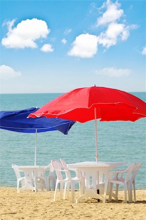 simsearch:400-06947087,k - Table, chairs and parasol on  the beach Stock Photo - Budget Royalty-Free & Subscription, Code: 400-04844697