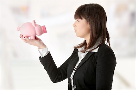 Woman Holding Piggy Bank Stock Photo - Budget Royalty-Free & Subscription, Code: 400-04844757