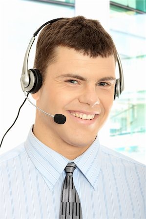 simsearch:400-06108986,k - Charming customer service representative with headset on Stock Photo - Budget Royalty-Free & Subscription, Code: 400-04844761