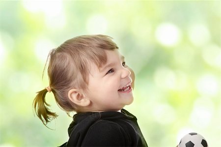 simsearch:400-04140663,k - Portrait of a 2 year old girl against abstract green background Photographie de stock - Aubaine LD & Abonnement, Code: 400-04844971