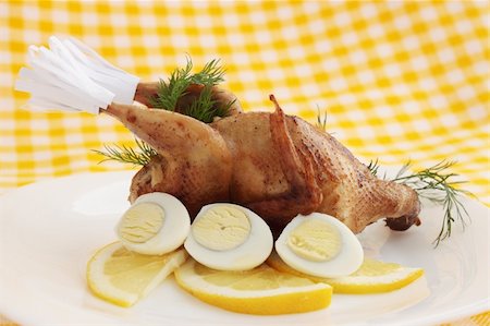 people eating eggs - baked quail with the lemon and the eggs Stock Photo - Budget Royalty-Free & Subscription, Code: 400-04845188