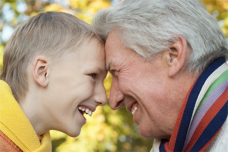 grandfather keeps his grandson in an outdoor Stock Photo - Budget Royalty-Free & Subscription, Code: 400-04845920