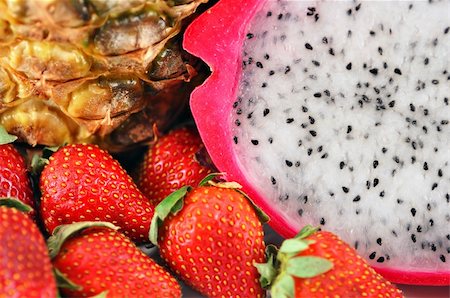 pineapple growing - Yummy healthy fruit mix: pineapple, straberriese and pitaya- dragon fruit. Stock Photo - Budget Royalty-Free & Subscription, Code: 400-04846073