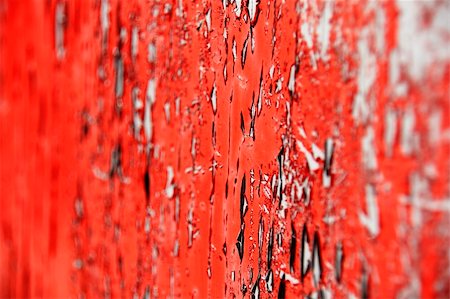 Peeling bright red paint on old door shot at an angle to get that very shallow DOF effect,focus in middle tier. Stock Photo - Budget Royalty-Free & Subscription, Code: 400-04846081