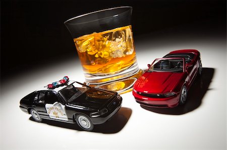 simsearch:400-04947548,k - Police and Sports Car Next to Alcoholic Drink Under Spot Light. Stock Photo - Budget Royalty-Free & Subscription, Code: 400-04846291
