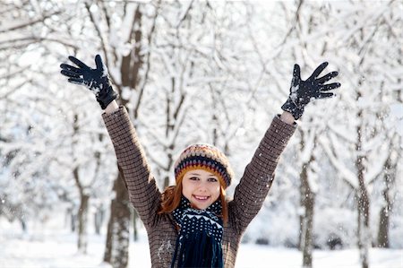 Beautiful young red-haired woman in winter park Stock Photo - Budget Royalty-Free & Subscription, Code: 400-04846349