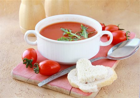 simsearch:400-06088770,k - tomato soup in a white bowl with arugula and cherry tomatoes Stock Photo - Budget Royalty-Free & Subscription, Code: 400-04846565