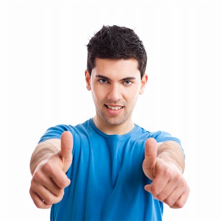 simsearch:400-04343310,k - Handsome young man with thumbs up on an isolated white background Photographie de stock - Aubaine LD & Abonnement, Code: 400-04846697