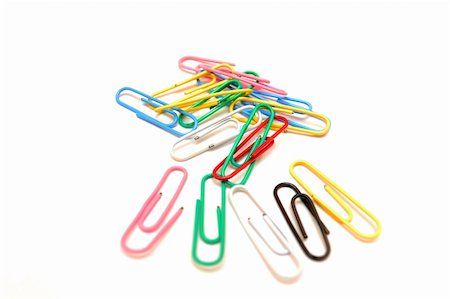 Photo of color paper clips on a white background. Stock Photo - Budget Royalty-Free & Subscription, Code: 400-04846900