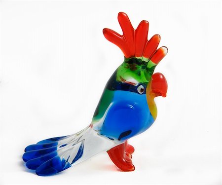 Colorfull glass statuette of a parrot isolated Stock Photo - Budget Royalty-Free & Subscription, Code: 400-04847315