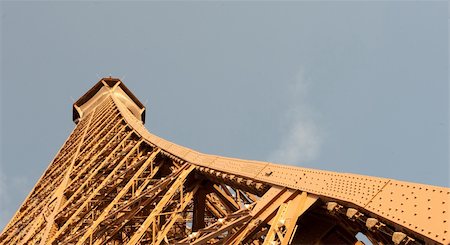 The top of the Eiffel Tower in Paris, France Foto de stock - Super Valor sin royalties y Suscripción, Código: 400-04847355