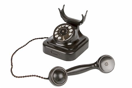 simsearch:400-07222578,k - Black retro-styled telephone isolated on a white background Foto de stock - Super Valor sin royalties y Suscripción, Código: 400-04847452