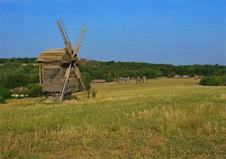 simsearch:400-06101286,k - The old windmill in the village has historically been used previously for the production of flour. windmill is a beautiful landscape decoration Stock Photo - Budget Royalty-Free & Subscription, Code: 400-04847591