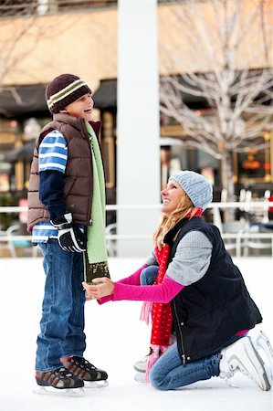 A mother and her son ice-skating Stock Photo - Budget Royalty-Free & Subscription, Code: 400-04847635