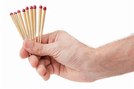 simsearch:700-00035023,k - Hand with matches on a white background Photographie de stock - Aubaine LD & Abonnement, Code: 400-04847655