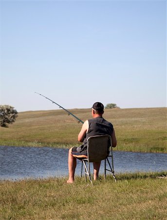 sibling sad - Fishing men at lake. Stock Photo - Budget Royalty-Free & Subscription, Code: 400-04848621