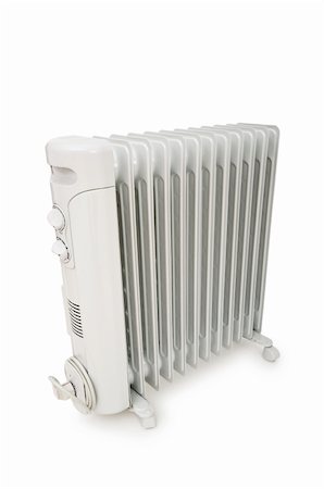 simsearch:400-08676685,k - Oil radiator isolated on the white background Stock Photo - Budget Royalty-Free & Subscription, Code: 400-04840674