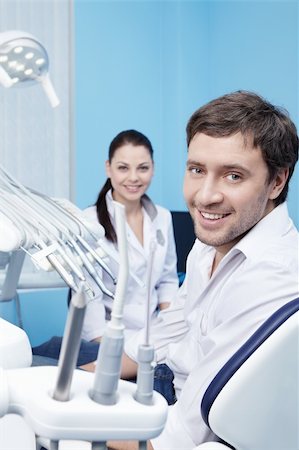 An attractive man at a reception at the dentist Stock Photo - Budget Royalty-Free & Subscription, Code: 400-04840766