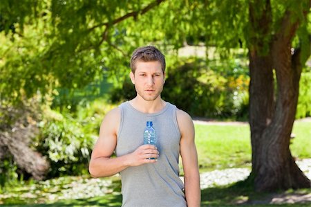 simsearch:400-05104948,k - Sporty  handsome man in the park Stock Photo - Budget Royalty-Free & Subscription, Code: 400-04840803
