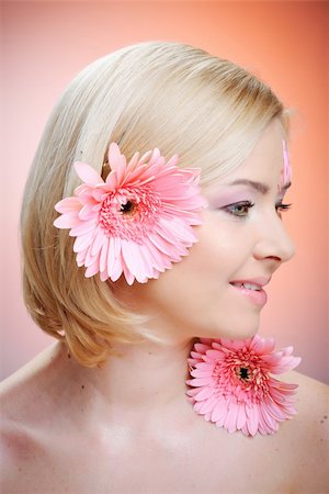 simsearch:400-04776576,k - Close-up of woman green eye. Pink flower on background. Stock Photo - Budget Royalty-Free & Subscription, Code: 400-04841378