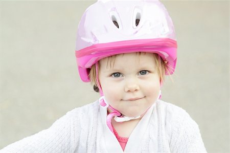 pulen (artist) - Cute little girl with bicycle helmet outdoors Stock Photo - Budget Royalty-Free & Subscription, Code: 400-04841550