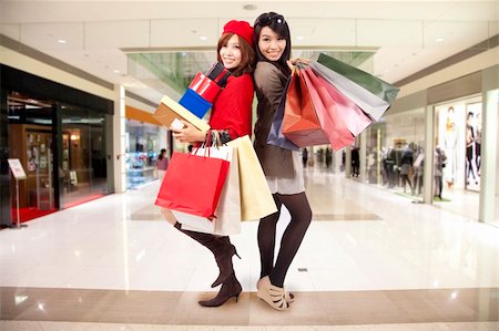 attractive young sister go shopping in the mall Stock Photo - Budget Royalty-Free & Subscription, Code: 400-04841951