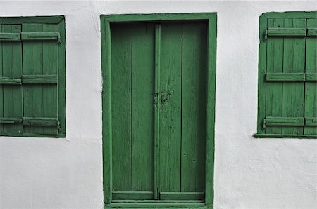 simsearch:400-04358196,k - Green door wooden window shutters and white wall. Foto de stock - Super Valor sin royalties y Suscripción, Código: 400-04842168