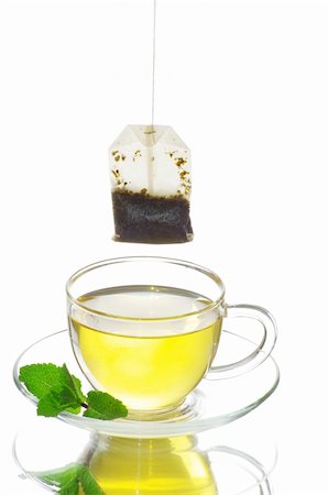 tea in cup with leaf mint  isolated on white background Stock Photo - Budget Royalty-Free & Subscription, Code: 400-04842174