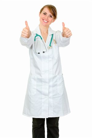 Smiling medical doctor woman showing thumbs up gesture isolated on white Stock Photo - Budget Royalty-Free & Subscription, Code: 400-04842472