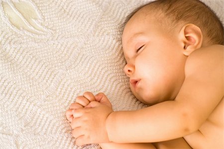 beautiful baby sleep on a white background Stock Photo - Budget Royalty-Free & Subscription, Code: 400-04842497