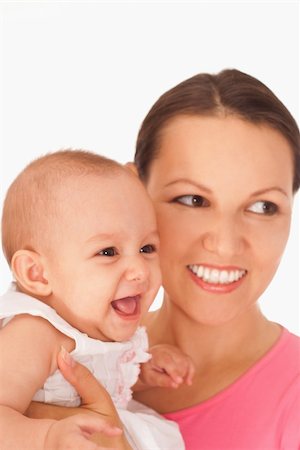 happy mother stands and holds the baby Stock Photo - Budget Royalty-Free & Subscription, Code: 400-04842544