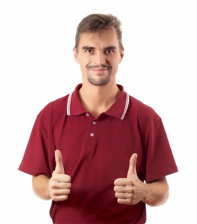 Happy casual young man showing thumb up and smiling isolated on white background Stock Photo - Budget Royalty-Free & Subscription, Code: 400-04842580