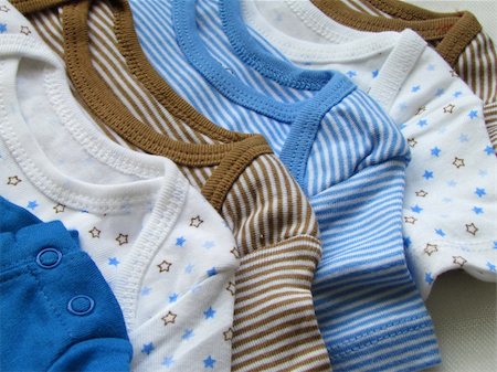 baby bodysuits of different colors Stock Photo - Budget Royalty-Free & Subscription, Code: 400-04842604