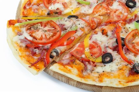 simsearch:400-08107342,k - pizza on a wooden board Stock Photo - Budget Royalty-Free & Subscription, Code: 400-04842727