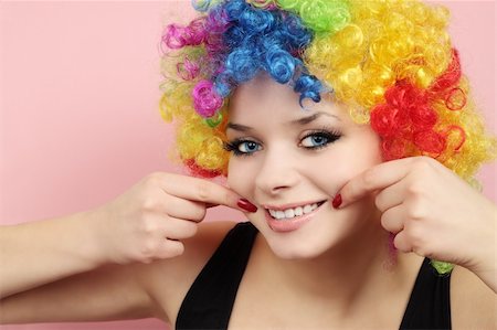 pretty woman laughter party - merry girl in the wig on the pink Stock Photo - Budget Royalty-Free & Subscription, Code: 400-04843297