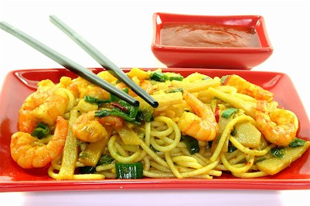 noodles with Asian prawns on Asian dishes Stock Photo - Budget Royalty-Free & Subscription, Code: 400-04843314