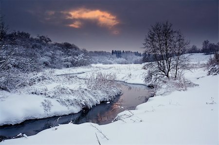 powder in water - Winter landscape with field and forest at sunny evening Stock Photo - Budget Royalty-Free & Subscription, Code: 400-04843640