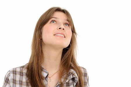 smart poses of teenager girl - Smiling the girl looking upwards  a white background Stock Photo - Budget Royalty-Free & Subscription, Code: 400-04843834