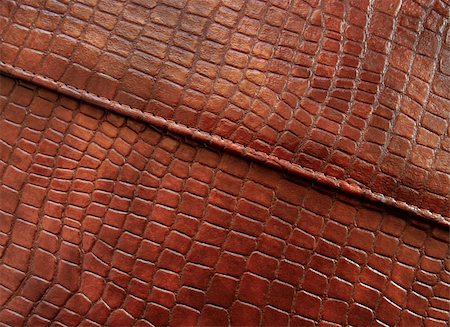 sello en relieve - Leather with crocodile dressed texture. Abstract background in chocolate color. Foto de stock - Super Valor sin royalties y Suscripción, Código: 400-04843842