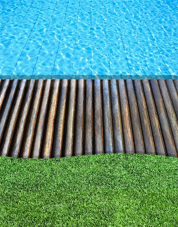 simsearch:400-04422689,k - wood floor and fresh grass beside the blue swimming pool Stock Photo - Budget Royalty-Free & Subscription, Code: 400-04843977