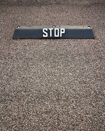 simsearch:400-05917229,k - Parking lot stop sign. Can be used as concept background. Foto de stock - Super Valor sin royalties y Suscripción, Código: 400-04854446