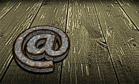 simsearch:400-06458048,k - rusty email symbol on grunge wooden background - 3d illustration Photographie de stock - Aubaine LD & Abonnement, Code: 400-04854561
